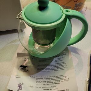 Hot/cold plastic Tea Ball filter, spoon, lid instructions Item#TB600cc NIB